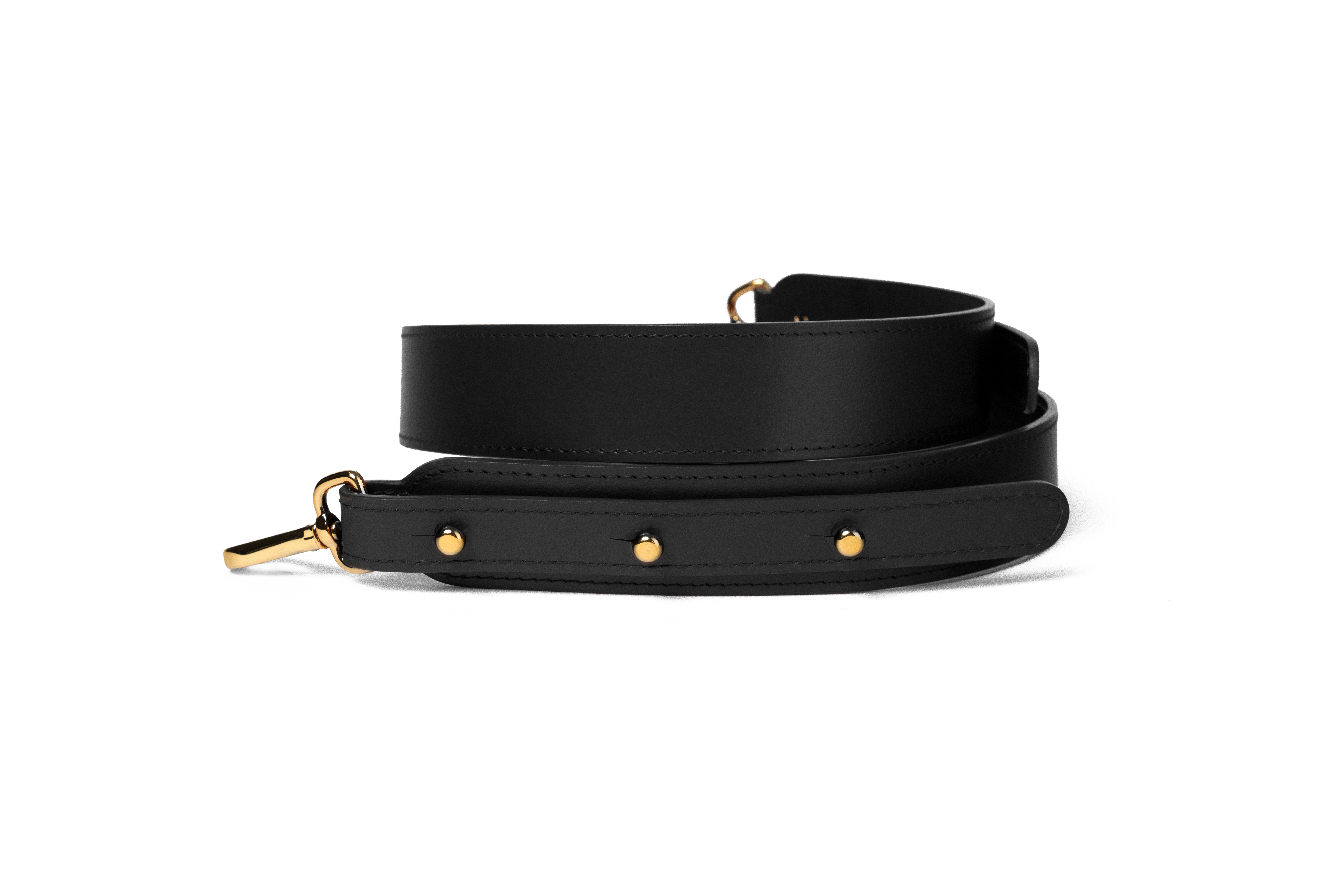 Bandoulière en cuir noir à rivets dorés